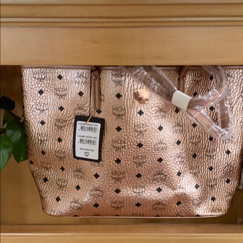 Gorgeous MCM Champagne gold tote bag never used
